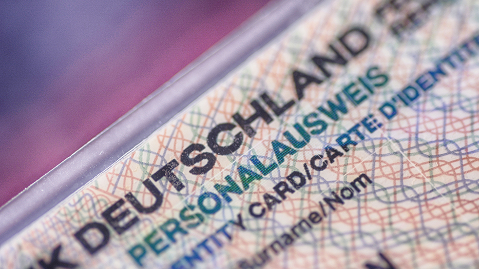 Detail of the upper edge of an German identity card. The words 